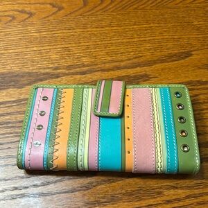 Multi color fossil wallet.